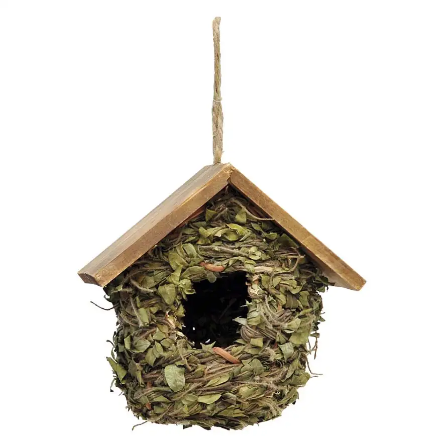 Little house with leaves and wooden roof